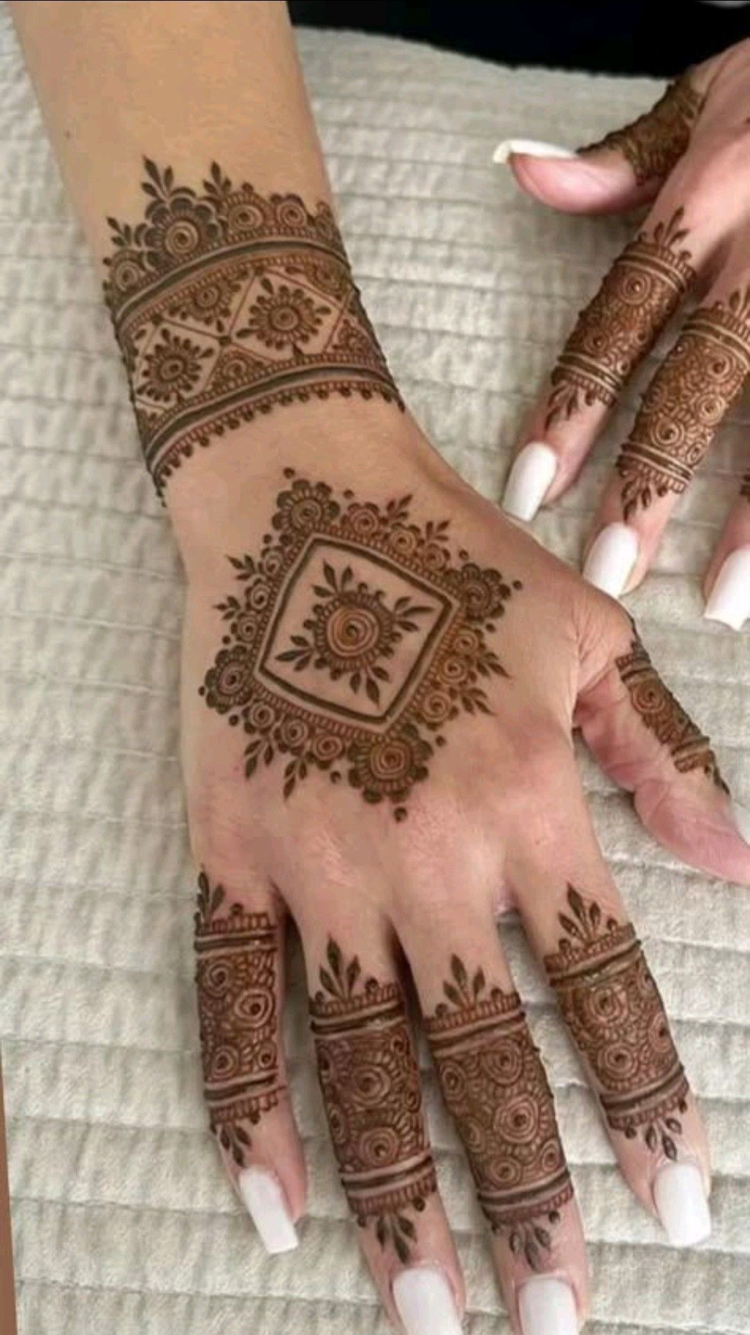 13 back hand mehndi design