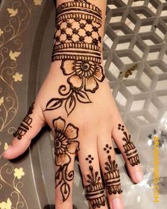 13 back hand mehndi design