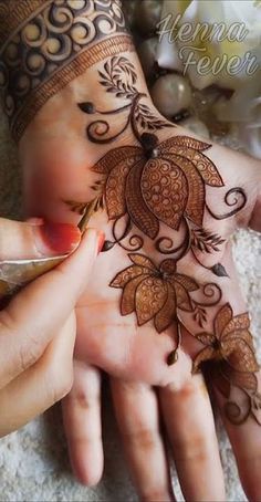 lotus mehndi design back hand