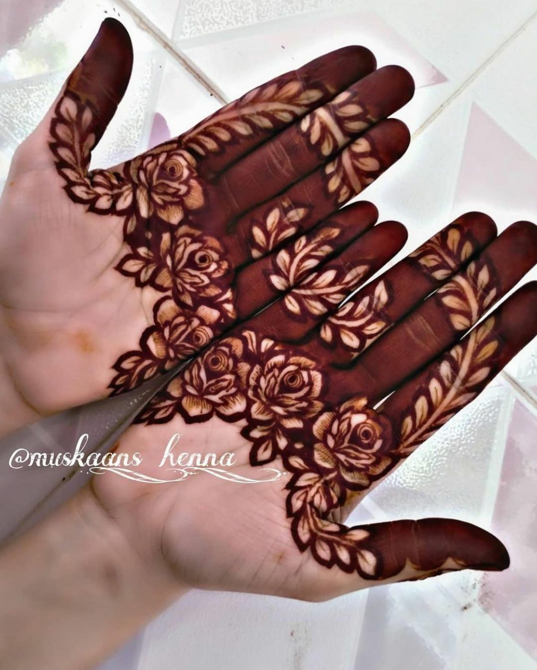 rose mehndi design back hand