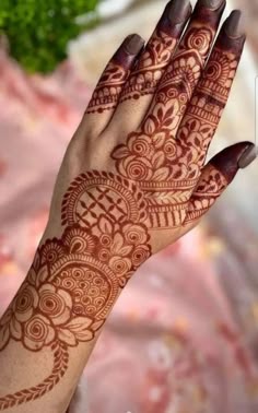 rose mehndi design back hand