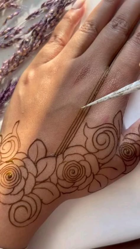 rose mehndi design back hand