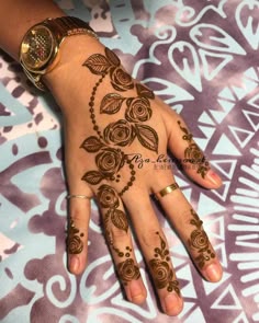 rose mehndi design back hand