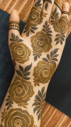 rose mehndi design back hand