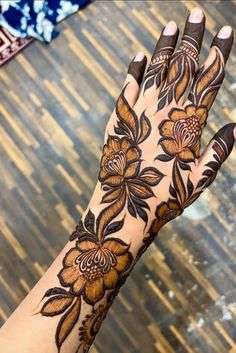 rose mehndi design back hand
