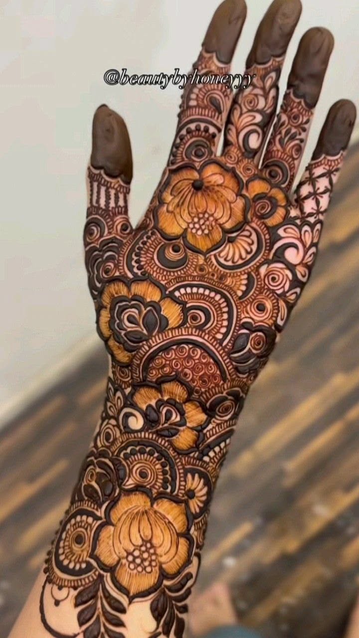 rose mehndi design back hand