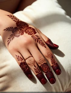rose mehndi design back hand