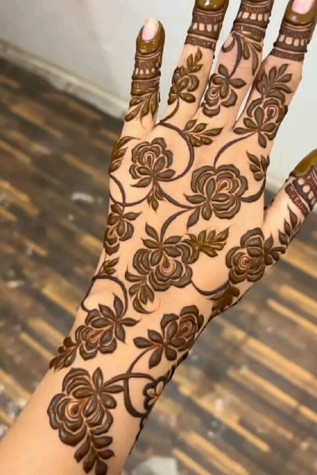 rose mehndi design back hand
