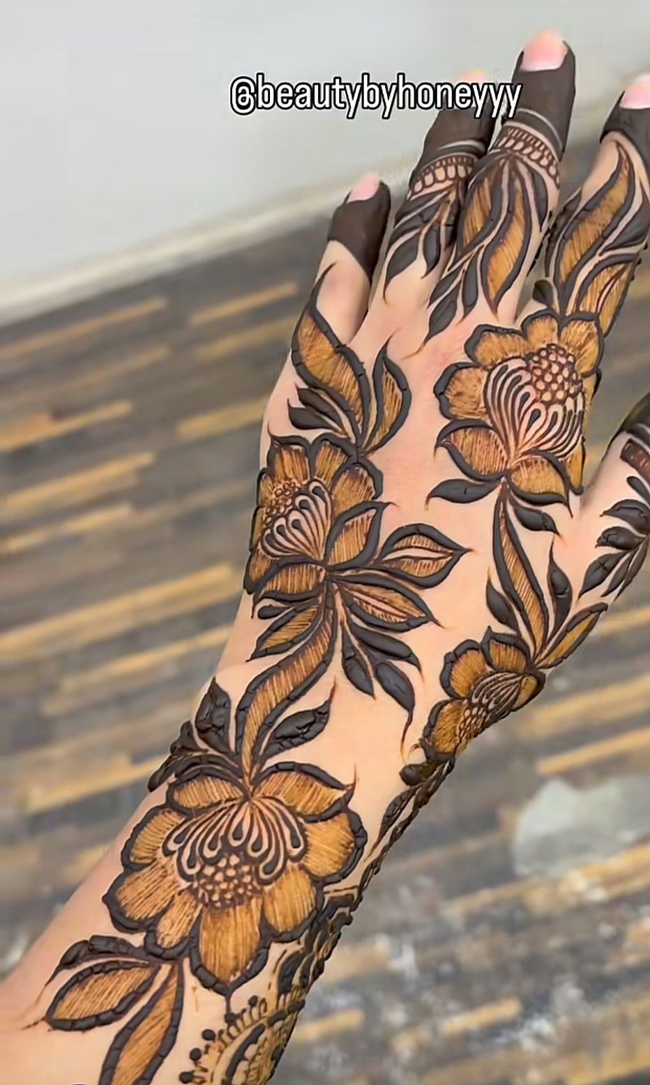 rose mehndi design back hand