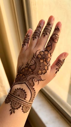 rose mehndi design back hand