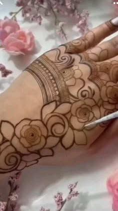 rose mehndi design back hand