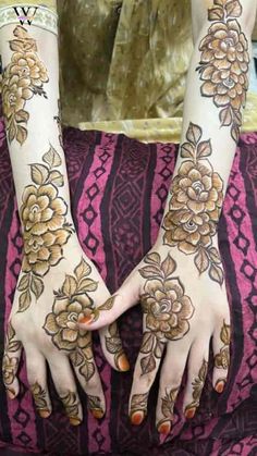 rose mehndi design back hand